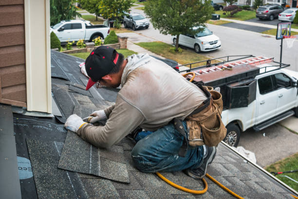 Professional Roofing technician working in Derby, CT